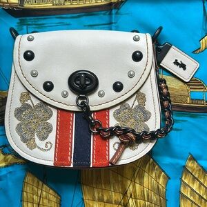 Coach Western Embroidery Turnlock Saddle Bag 17 In Glovetanned Leather